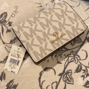 Jet set charm wallet